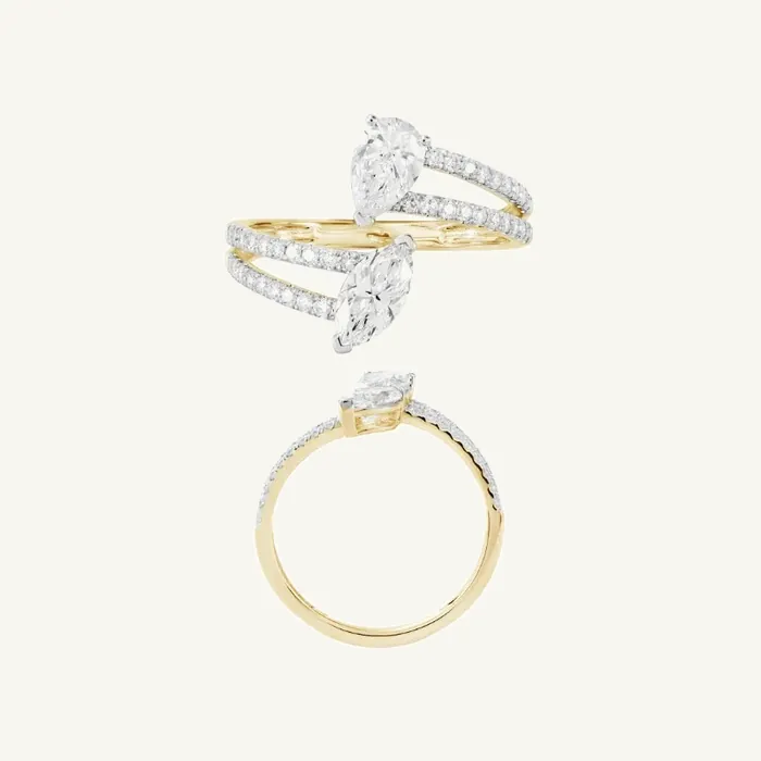 Обвивающее кольцо с камнями огранки «груша» и «маркиз» · 1.34 ct